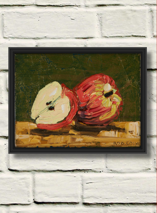 artist rod coyne's still life painting "apple still life" is shown here, in a black frame on a white wall.