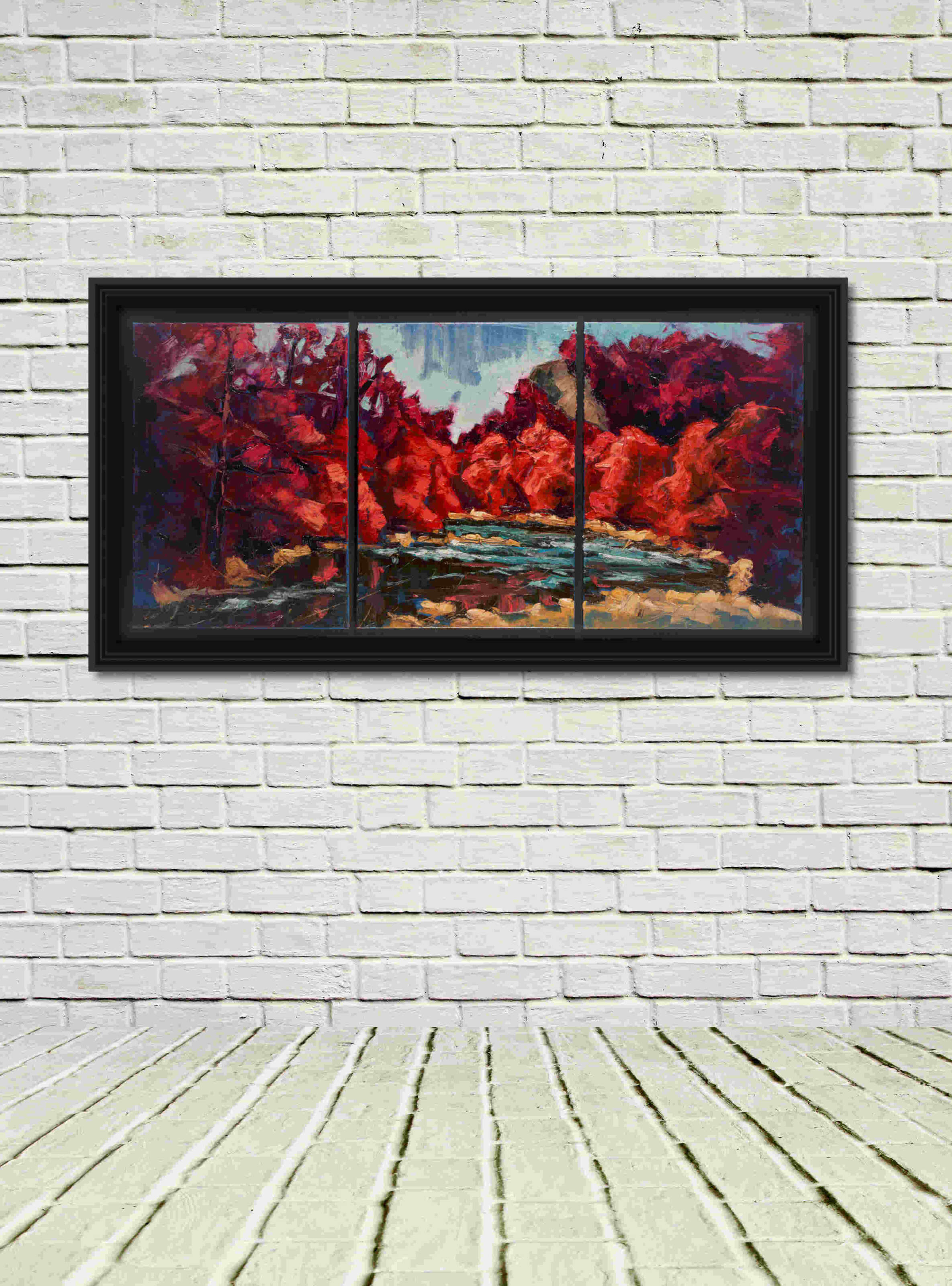Artist Rod Coyne's triptych "Avoca Downriver" is shown here, black framed triptych in a white room.